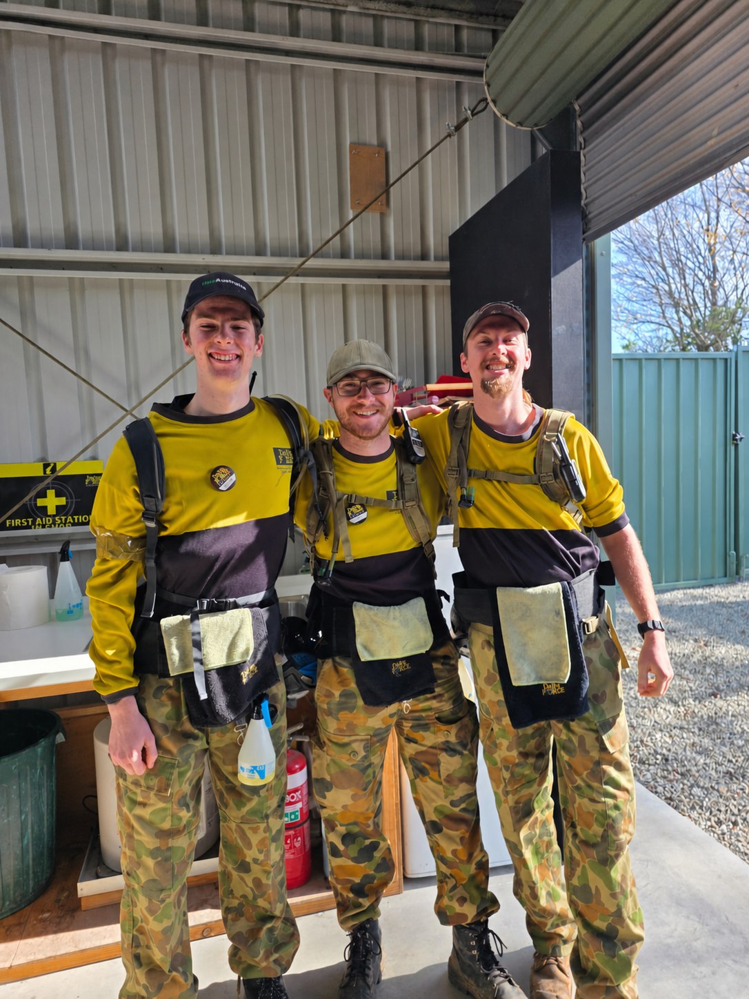 Three smiling Delta Force marshals ready for the day's sessions